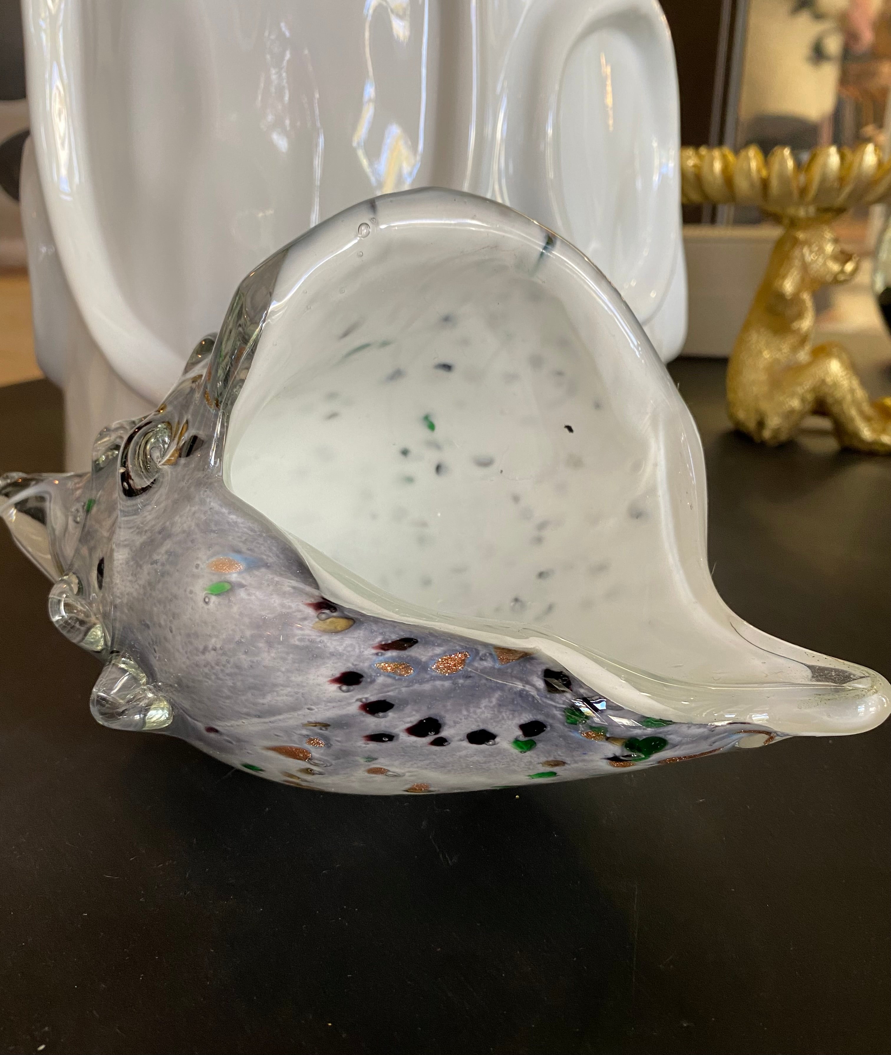 Grey spotted glass shell