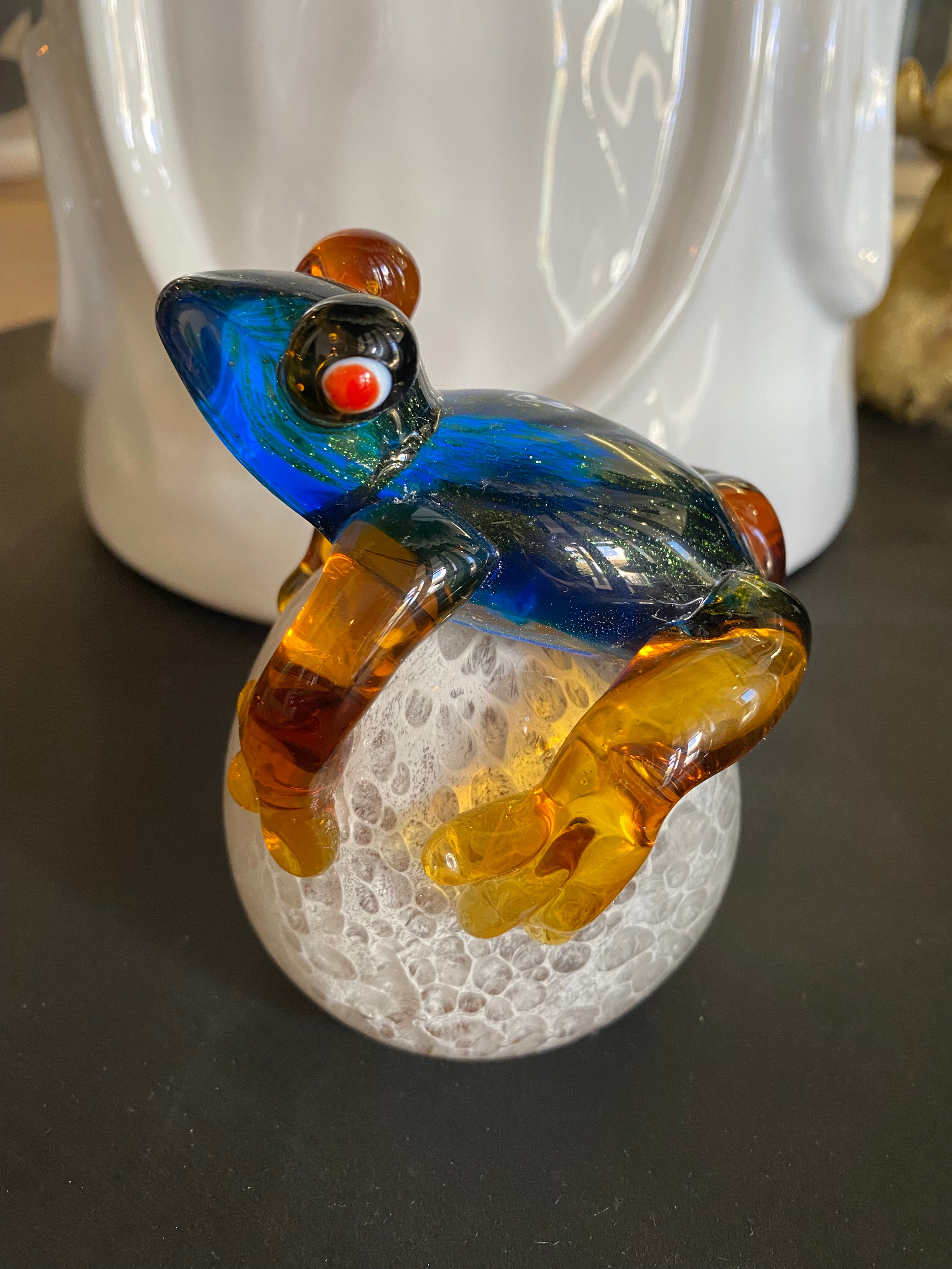 Glass frog on pebble